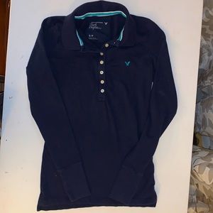 American Eagle Outfitters Navy Blue Long Sleeve knit 7-button polo shirt.